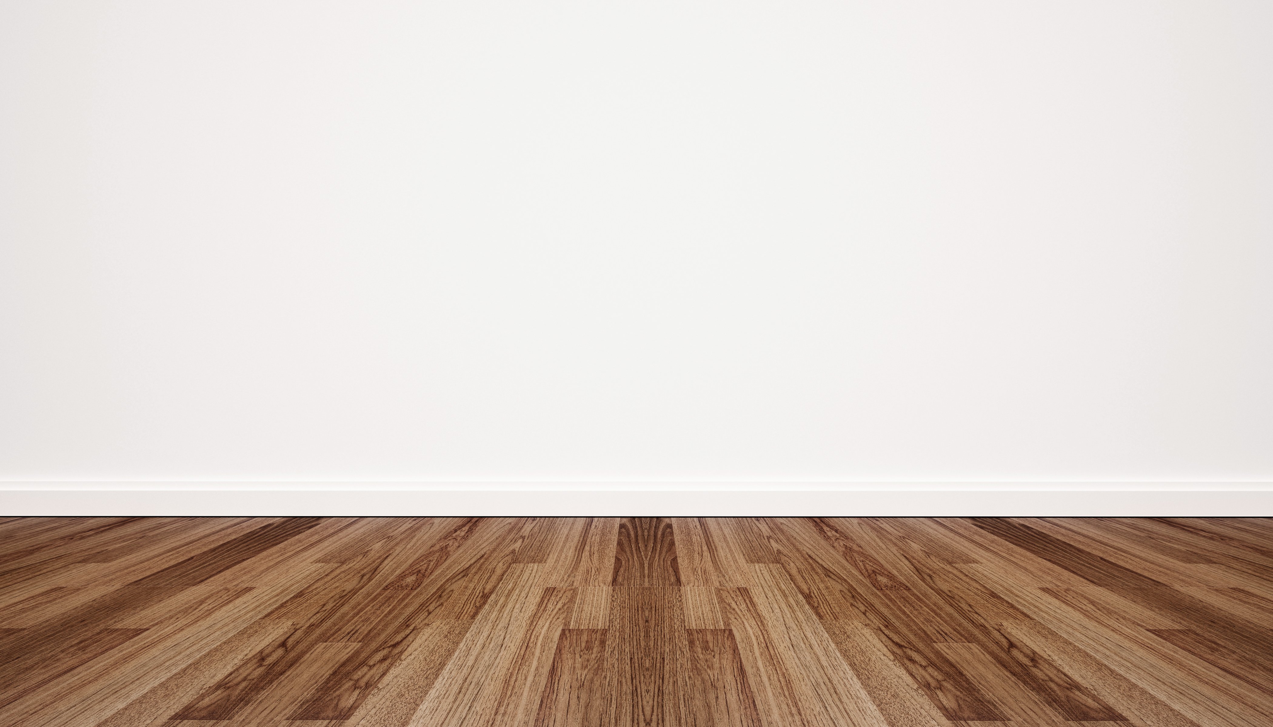 Wood floor with white wall